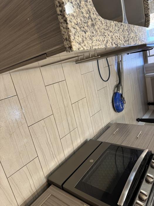 Professional tile and grout cleaning in kitchen