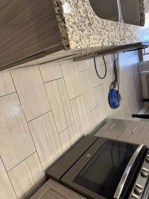 Professional tile and grout cleaning in kitchen